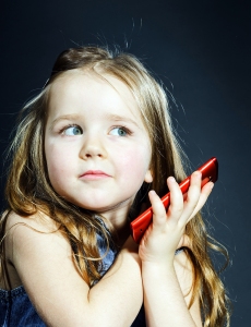 Cute Little Girl Speaks Using New Cell Phone.